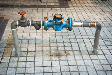 Image showing Main Water Line with Meter and Valve on Public Sidewalk