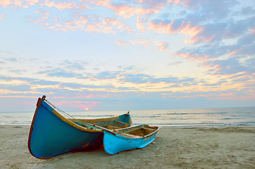 Image showing two Fishing boats and sunrise 