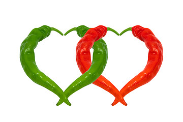 Image showing Red and green chili peppers in love