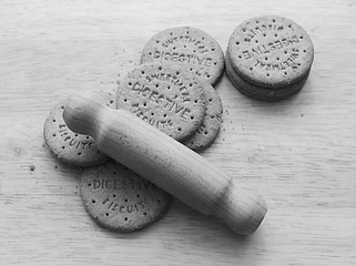 Image showing Starting to crush digestive biscuits with a rolling pin