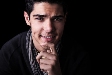 Image showing Young Man Portrait on Black