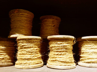 Image showing Old wooden twine bobbins