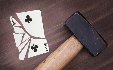 Image showing Hammer with a broken card, two of clubs