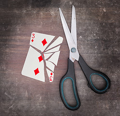 Image showing Concept of addiction, card with scissors