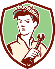 Image showing Female Mechanic Worker Holding Spanner Retro