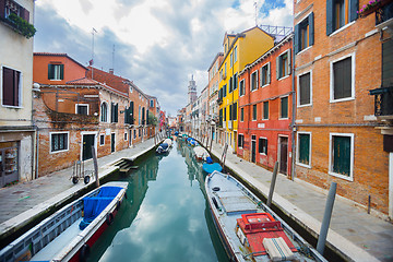 Image showing Boats tied along water canal