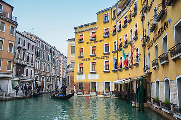 Image showing Gondola with tourists sailing in water canal