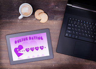 Image showing Online dating on a tablet