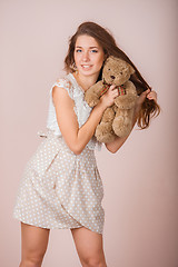 Image showing Girl and teddy bear