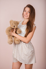 Image showing Girl and teddy bear