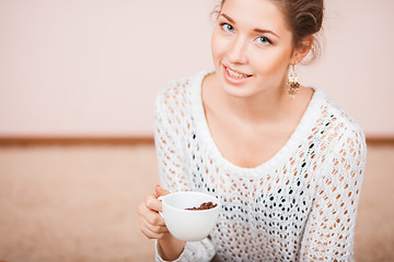 Image showing Smiling Woman with cup of coffee