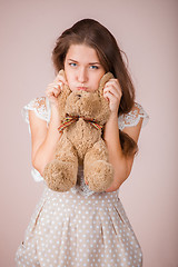 Image showing Girl and teddy bear