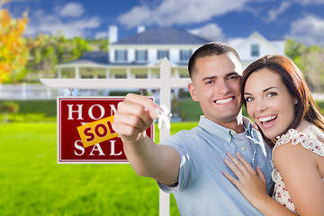 Image showing Military Couple In Front of Home, House Keys and Sign