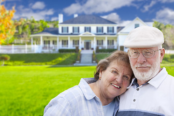 Image showing Happy Senior Couple in Front of House