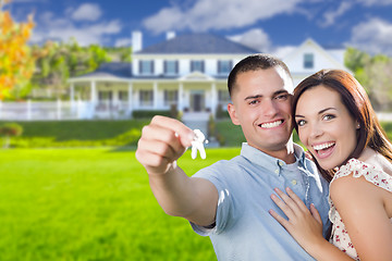 Image showing Military Couple with House Keys In Front of New Home