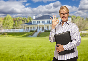 Image showing Attractive Businesswoman In Front of Nice Residential Home