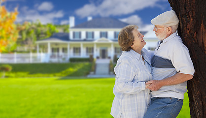 Image showing Happy Senior Couple in Front Yard of House