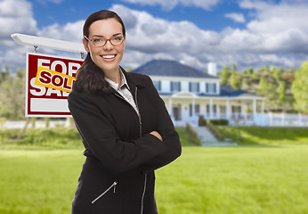 Image showing Mixed Race Woman in Front of House and Sold Sign