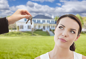 Image showing Agent Handing Mixed Race Woman Keys In Front of House