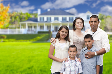 Image showing Young Hispanic Family in Front of Their New Home