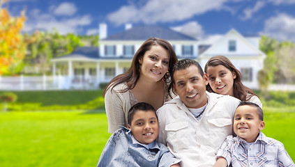Image showing Young Hispanic Family in Front of Their New Home