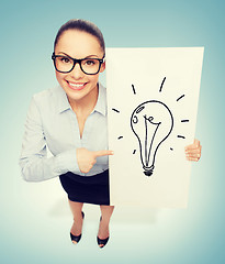 Image showing smiling businesswoman with white board