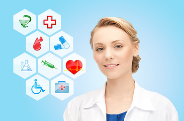 Image showing smiling doctor over medical icons blue background