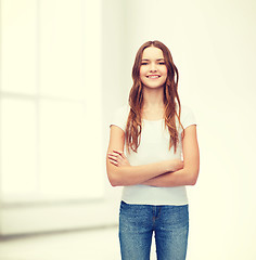 Image showing smiling teenager in blank white t-shirt