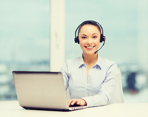 Image showing friendly female helpline operator