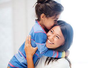 Image showing hugging mother and daughter