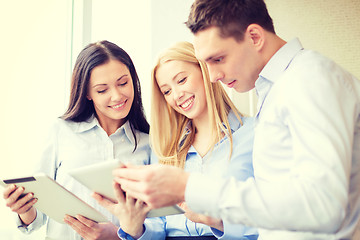 Image showing business team working with tablet pcs in office