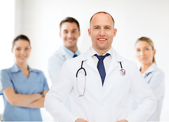 Image showing smiling male doctor with stethoscope