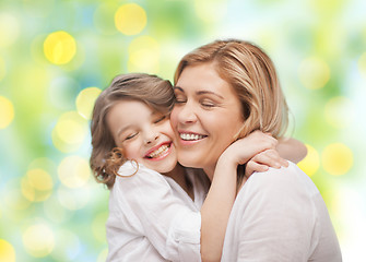 Image showing happy mother and daughter hugging