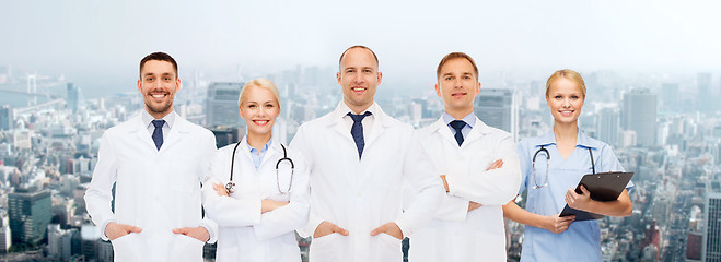Image showing group of doctors with stethoscopes and clipboard