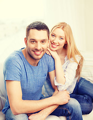 Image showing smiling happy couple at home