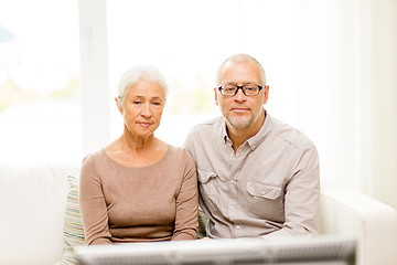 Image showing senior couple watching tv at home