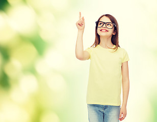 Image showing smiling cute little girl in black eyeglasses