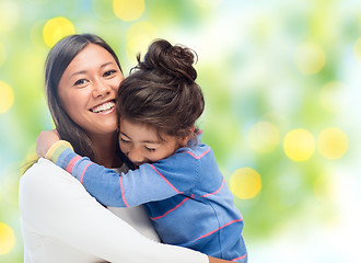 Image showing happy mother and daughter hugging