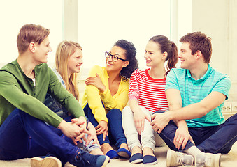 Image showing five smiling teenagers having fun at home