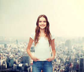 Image showing smiling teenager in blank white t-shirt