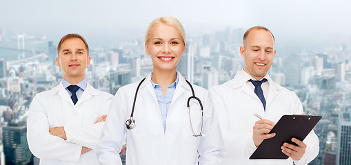 Image showing group of doctors with stethoscopes and clipboard