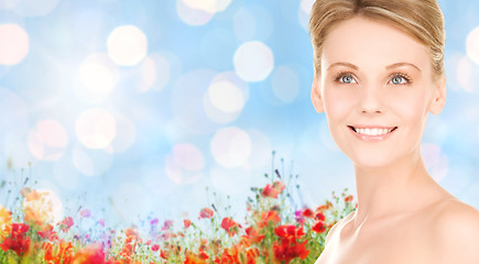 Image showing close up of smiling woman over natural background