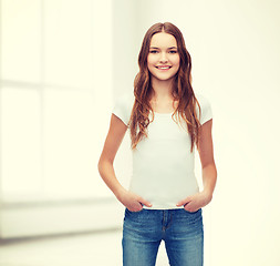 Image showing smiling teenager in blank white t-shirt