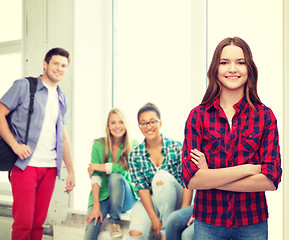 Image showing smiling young woman in casual clothes