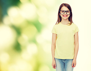 Image showing smiling cute little girl in black eyeglasses