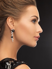 Image showing woman wearing shiny diamond earrings