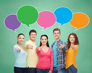 Image showing group of smiling teenagers with text bubbles