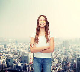 Image showing smiling teenager in blank white t-shirt