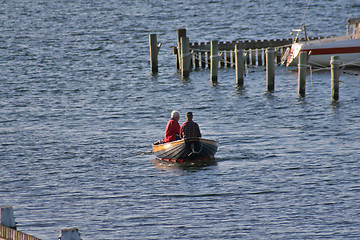 Image showing An elderly couple in a boat