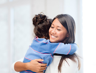 Image showing hugging mother and daughter